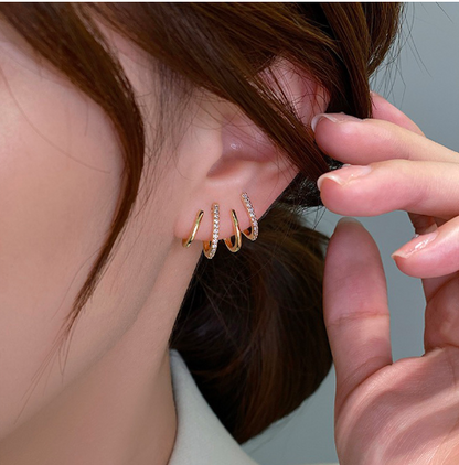 49% SLEVA🌟【Kupte 1 a získejte 1 zdarma】Náušnice s třpytivými zirkony ve tvaru drápků, elegantní a jednoduchý styl