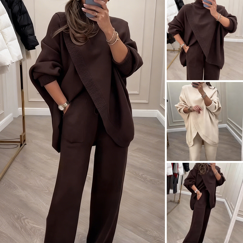 🔥【Akcija – Popust do 50%】✨Ženski elegantni komplet – pleteni pulover s visokim ovratnikom i križnim dizajnom + hlače širokih nogavica, super udobne