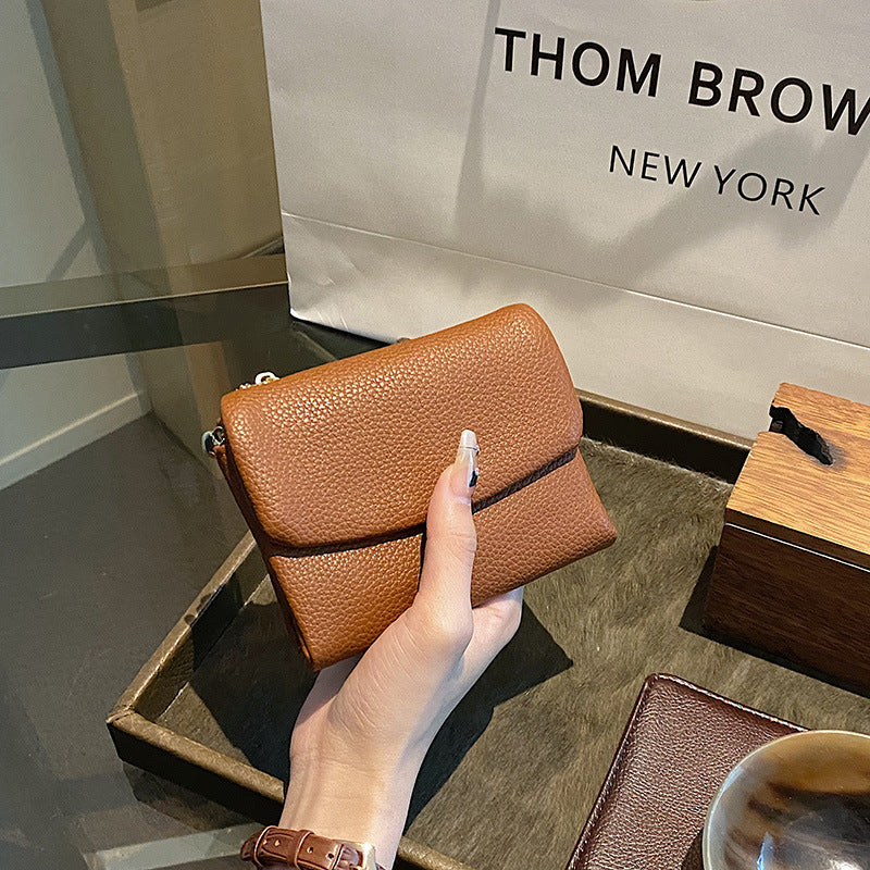 🔥Portfel uniseks o prostym designie z prawdziwej skóry, dużej pojemności, z ochroną RFID🔥